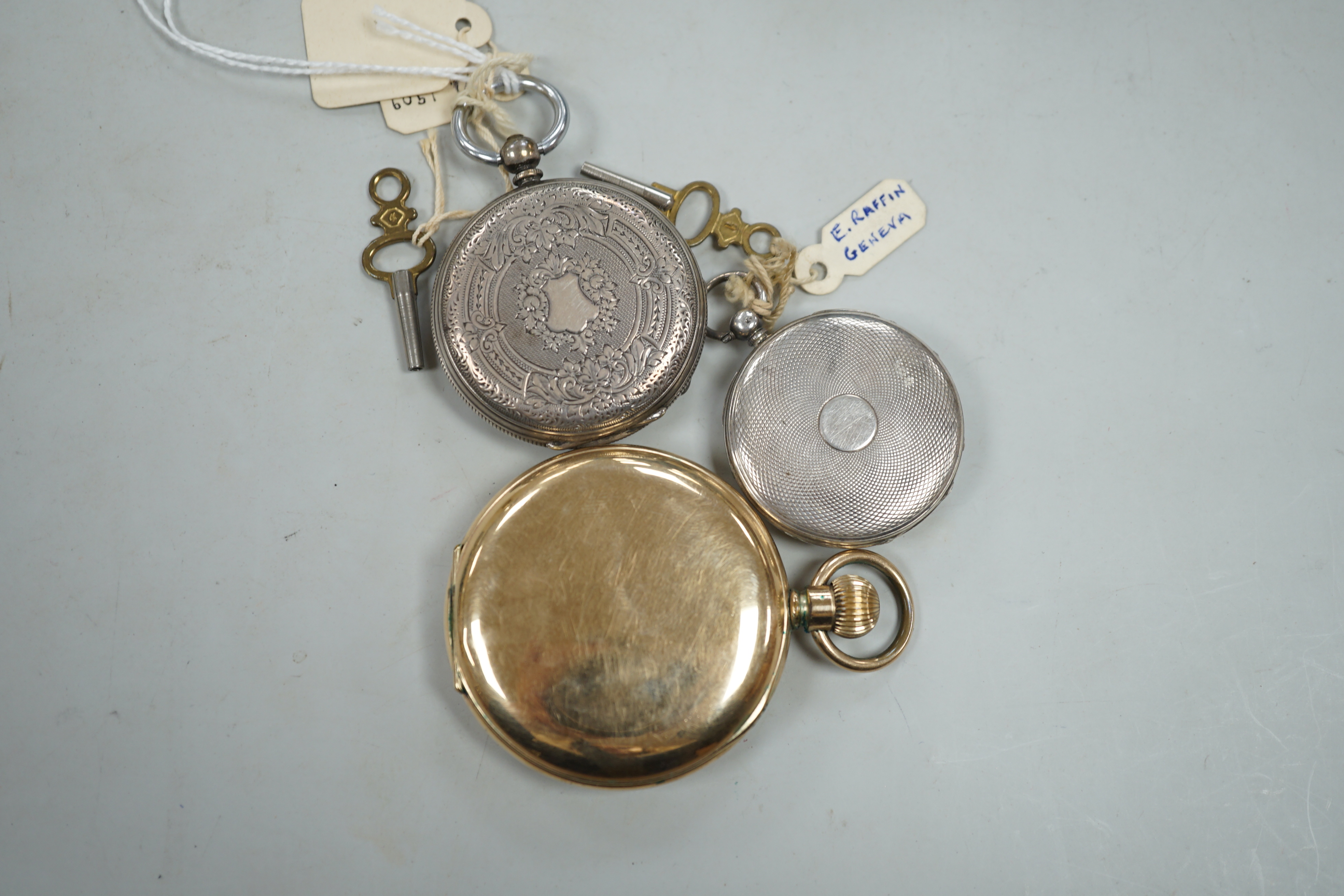 A Waltham gold plated hunter pocket watch and two fob watches, one silver.